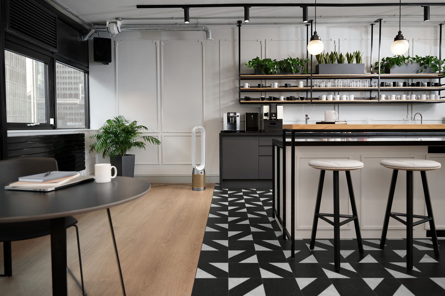 A dyson air purifier in a cafe.